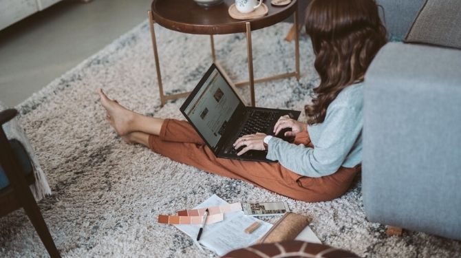 girl working on the rug